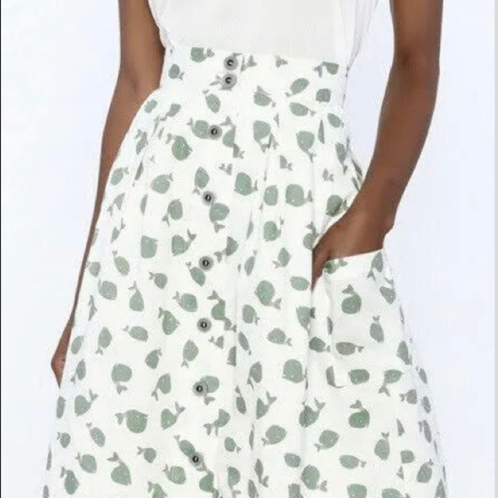Cute Tulip brand womens skirt with whales and white background